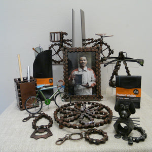 Collection of upcycled bits from bicycles - bike chains, inner tubes, made into glasses case, trivet, book ends, picture frame, penpot, keyrings 