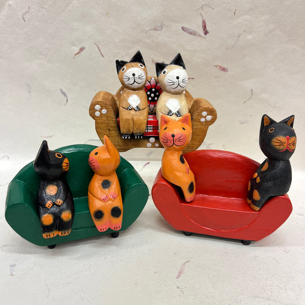 Cats, Bears and Pandas Sitting on Various Sofas