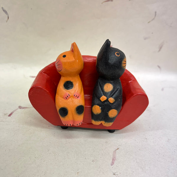 Cats, Bears and Pandas Sitting on Various Sofas