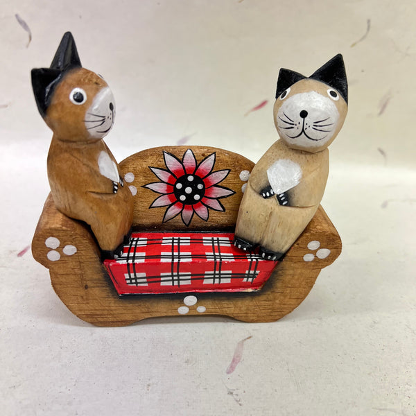 Cats, Bears and Pandas Sitting on Various Sofas