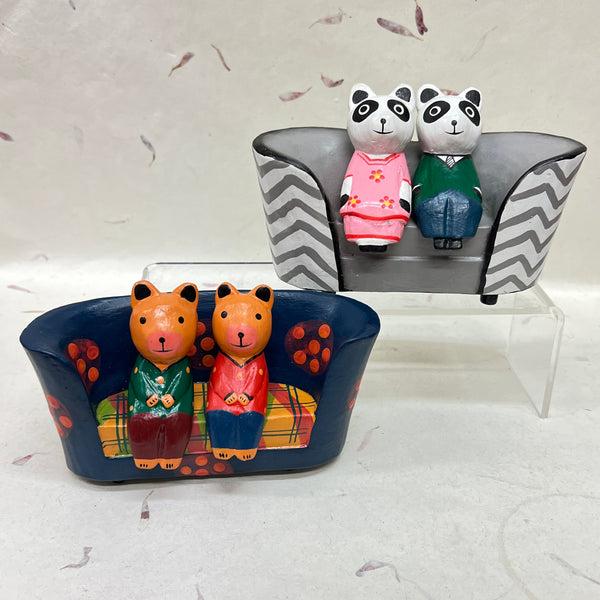 Cats, Bears and Pandas Sitting on Various Sofas