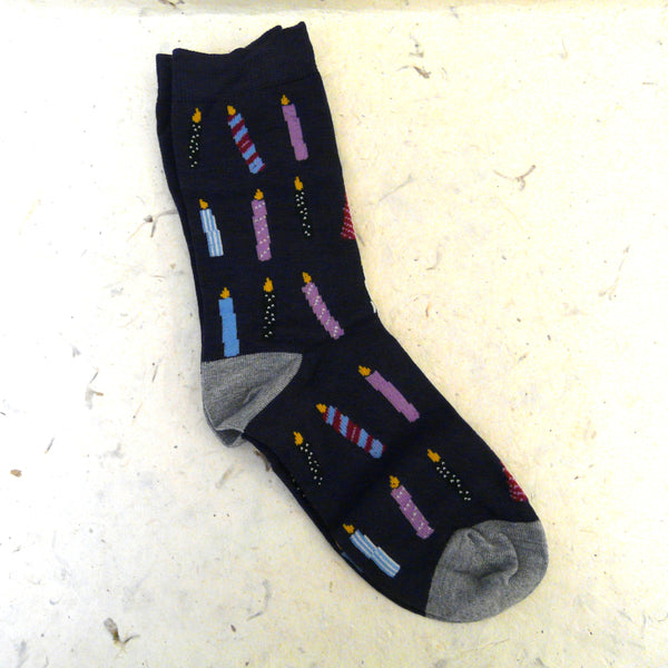 Navy-socks-grey-heels-and-toes-decorated-with-5-rows-of-candles-(3-on-leg-2-on-foot)-in-assorted-mixed-stripes-or-spots-in-2-colours-yellow-flame-on-top