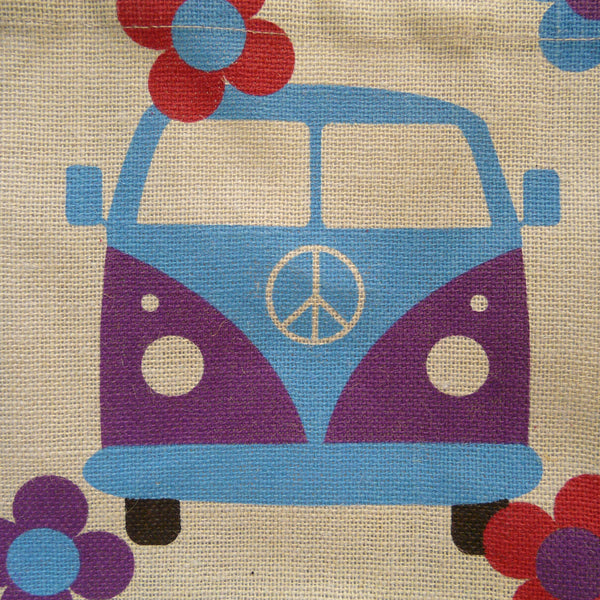 Detail of blue and purple Campervan with CND logo on centre front of van picture on