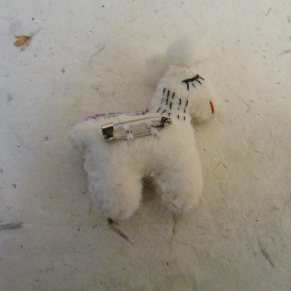 White Llama Brooch with Striped Felt Blanket