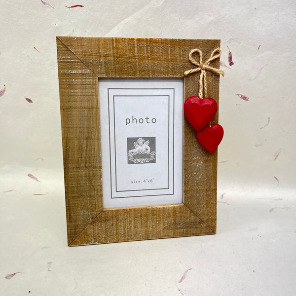 Driftwood Picture Frames with hanging hearts