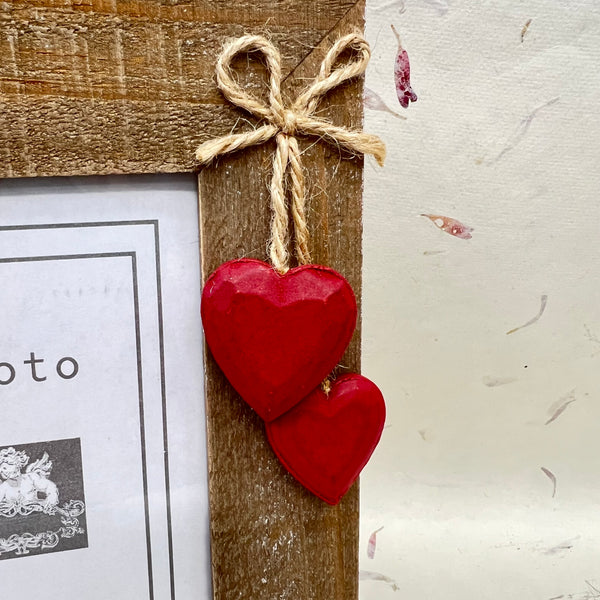 Driftwood Picture Frames with hanging hearts