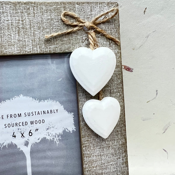 Driftwood Picture Frames with hanging hearts