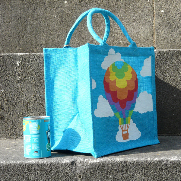 fair-trade-square-blue-jute-shopping-bag-multicoloured-hot-air-balloon-white-clouds-sideview