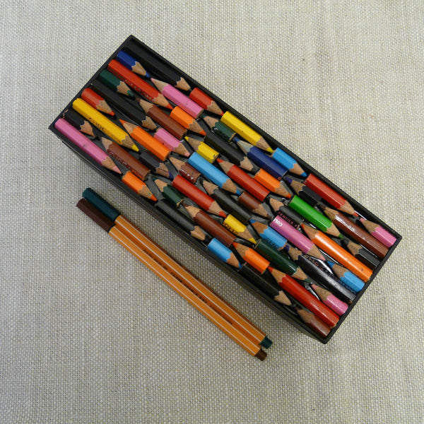 P1110139-Fair-Trade-Upcycled-Crayons-Rectangular-Pencil-Box-Top-view-with-pens